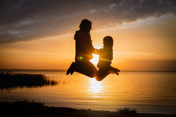 Wall Mural - happy mother with little daughter have fun in sunset nature