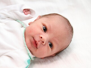 Sticker - little baby looking after having a good night sleep on white background