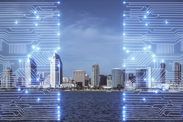 Double exposure of technology theme hologram and cityscape background. Concept of Hightech.