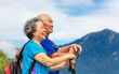 © Tom Wang - happy asian senior couple hiking in nature
