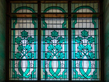 Beautiful Stained Glass Window With Green Grape Leaf Design.