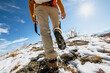 © cppzone - Lady hiker goes uphill at snowy surface