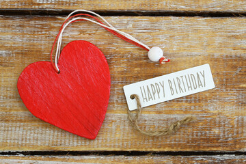 Wall Mural - happy birthday card with red wooden heart on rustic wood