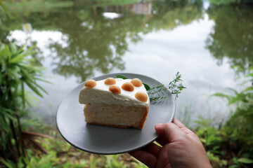 Wall Mural - coconut cake with cream and macadamia