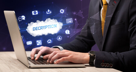 businessman working on laptop with decryption inscription, modern technology concept