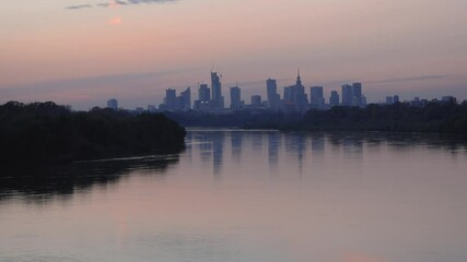 Poster - 4k footage of sunset over city downtown, view from Siekierkowski Bridge in Warsaw, capital of Poland