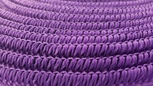 Purple Woven Mat Making Geometric Shapes And Patterns