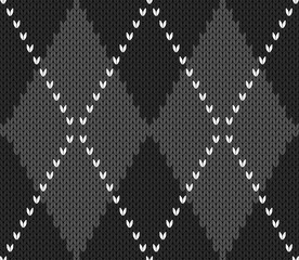 Wall Mural - Knitted argyle Halloween pattern. Wool knitinng. Scottish plaid in gray and black rhombuses. Traditional  Scottish background of diamonds . Seamless fabric texture. Vector illustration