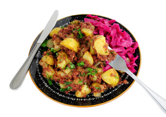 Wall Mural - Corned beef hash meal with pickled red cabbage isolated on a white background