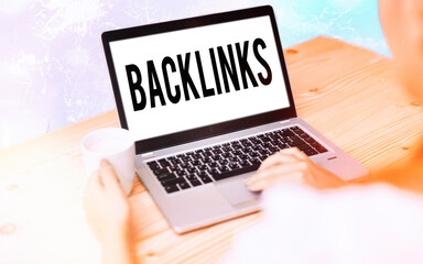 Wall Mural - Conceptual hand writing showing Backlinks. Concept meaning links from one website to a page on another website or page Modern gadgets white screen under colorful bokeh background