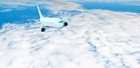 White passenger airplane over the clouds  - Travel by air transport