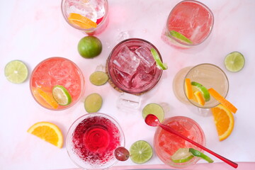 Wall Mural - cocktails selection with lemonade and vodka on white background