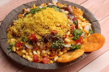 Bhelpuri Chaat/chat is a road side tasty food from India, served in a plate.