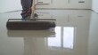 A contractor painter will paint the garage floor to speed up the sale of your home. Floor screed filling, repair and finishing. Fill in the low spots with self-leveling compound for a fine leveling. 