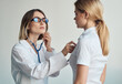 © SHOTPRIME STUDIO - Health problems female patient and professional doctor glasses model stethoscope
