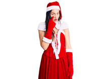 Young Beautiful Caucasian Woman Wearing Santa Claus Costume Pointing To The Eye Watching You Gesture, Suspicious Expression
