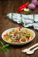 Thai food; stir-fried instant noodles with seafood and variety vegetable