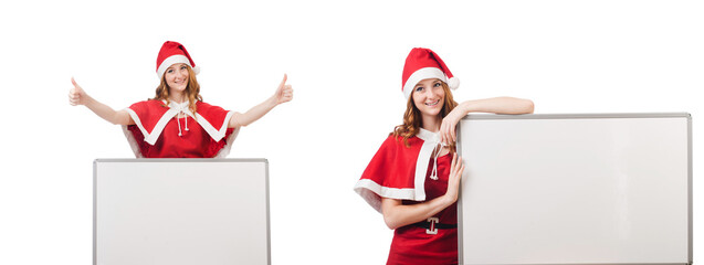 Wall Mural - Young woman in red santa costume with blank board