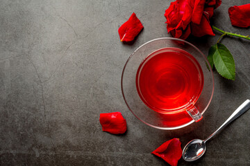 Hot rose tea on table