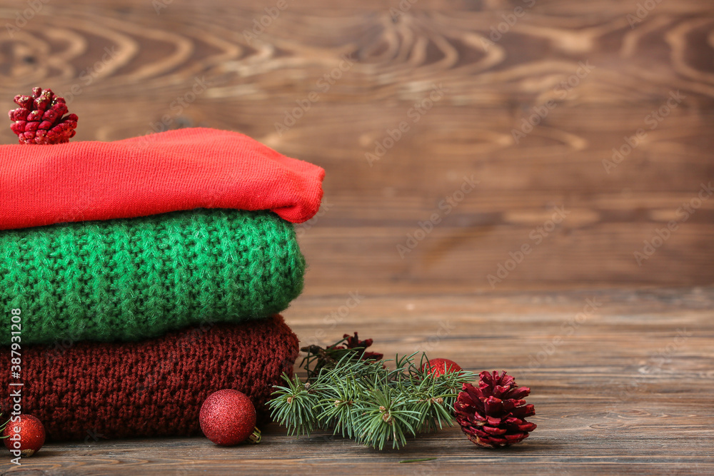 Stylish Christmas clothes on table