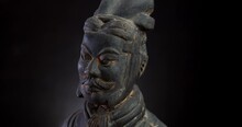 Head Of Terracotta Warrior On Black Background