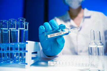 Wall Mural - vaccine research scientist in laboratory, coronavirus covid-19 vaccine development