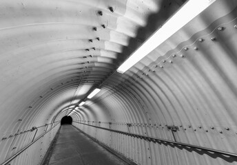 Poster - Empty pedestrian tunnel at night. Architecture abstract background