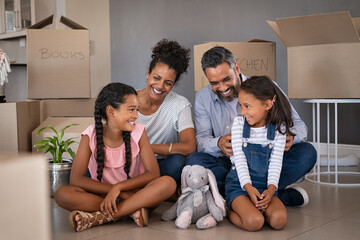 Wall Mural - Ethnic family enjoy new house after moving day