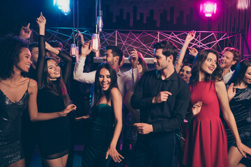 Poster - Photo portrait of cheerful excited people dancing together at luxury party in pink and blue neon lights