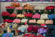 Colorful showcase of flower shop with large assortment of natural and fresh flowers