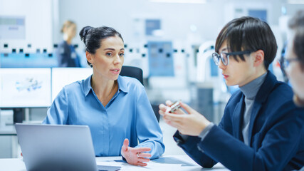Poster - Modern Factory Office Meeting Room: Multi Ethnic and Diverse Team of Engineers, Managers and Investors Talking Sitting at Conference Table, Analyzing Computer Printed Circuit Board Element
