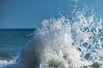 Wall Mural - Wave of the sea water at sunny day time.