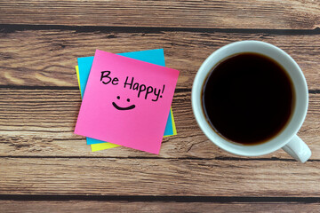 Wall Mural - Be Happy quotes on paper note with cup of coffee
