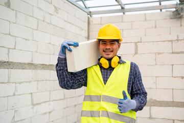 Aufkleber - Masonry worker make concrete wall by cement block and plaster in the new house under construction.