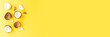 © One Pixel Studio - Broken coconut on yellow background. Top view. Banner