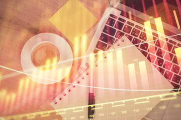 Wall Mural - Double exposure of forex chart drawing over table background with computer. Concept of financial research and analysis. Top view.