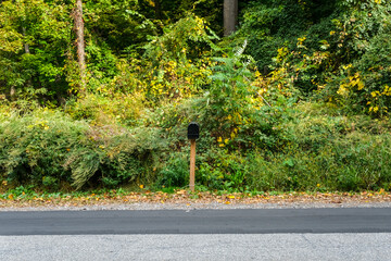 Sticker - A Mailbox in a park
