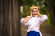 © muro - Slovak folklore. Girl in slovak folk dress.
