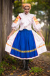 © muro - Slovak folklore. Girl in slovak folk dress.