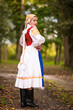 © muro - Slovak folklore. Girl in slovak folk dress.