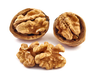 Wall Mural - Walnuts and shells lie on a white background.Isolate