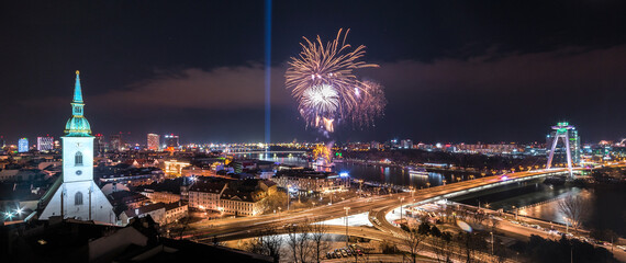 Wall Mural - New Year Celebration. Fireworks on Danube River in Bratislava, Slovakia.