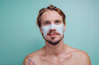 © AD Photography/Stocksy - Young Male with Face mask