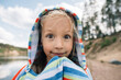 © Evgenij Yulkin/Stocksy - Child in towel