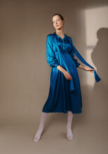 Elegant Model In Blue Dress Dancing