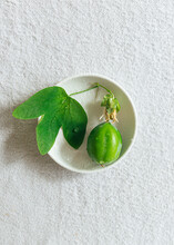 Green Fruit From Passiflora Plant, A Species From The Passion Fruit Family