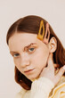 © Sergey Filimonov/Stocksy - Young model with stylish hair clips