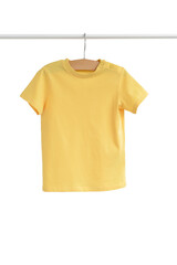 Wall Mural - Yellow t-shirt hanging on shoulders  isolated on white background for summer wardrobe/ Baby clothes