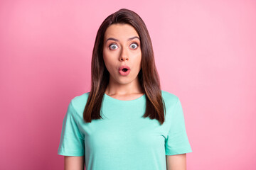 Sticker - Portrait photo of shocked young woman starring with opened mouth isolated on pastel pink color background in turquoise t-shirt