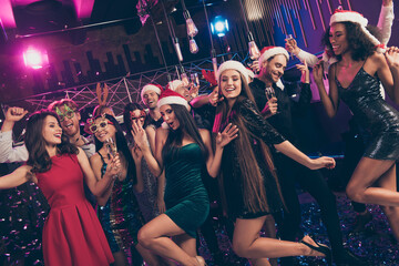 Poster - Photo of funky people careless festive mood celebrate party wear mini dress x-mas cap glasses modern club indoors